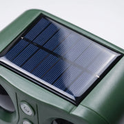 AvisGuard  - Solar Ultrasonic Animal Repellent Setting Up In Flowerbeds