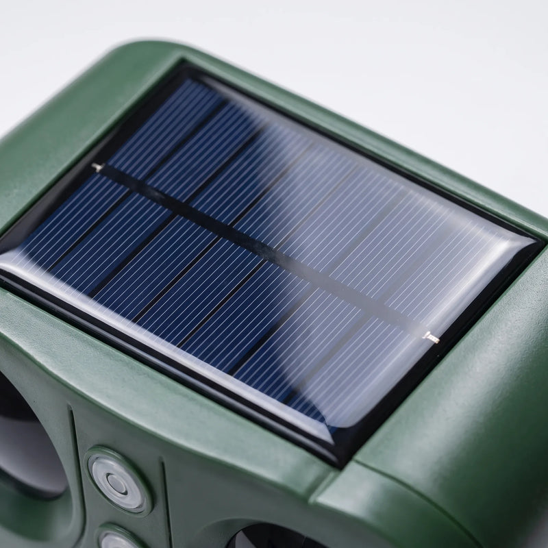 AvisGuard  - Solar Ultrasonic Animal Repellent Setting Up In Flowerbeds